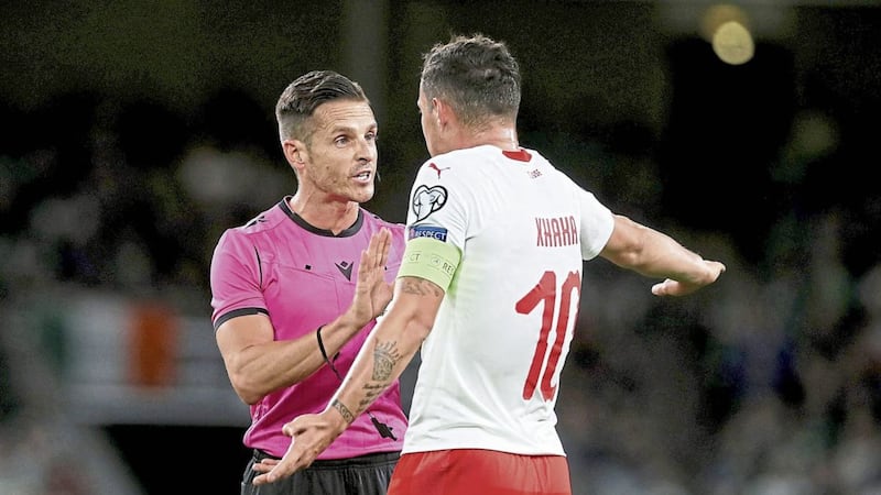 Switzerland&#39;s Granit Xhaka is spoken to by match referee Carlos Del Cerro Grande during the UEFA Euro 2020 Qualifying Group D match at the Aviva Stadium, Dublin. The game finished 1-1 with the Republic of Ireland 