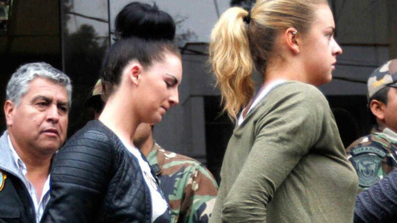 Michaella McCollum and Melissa Reid in handcuffs to be charged for drug trafficking. Picture by Martin Mejia 