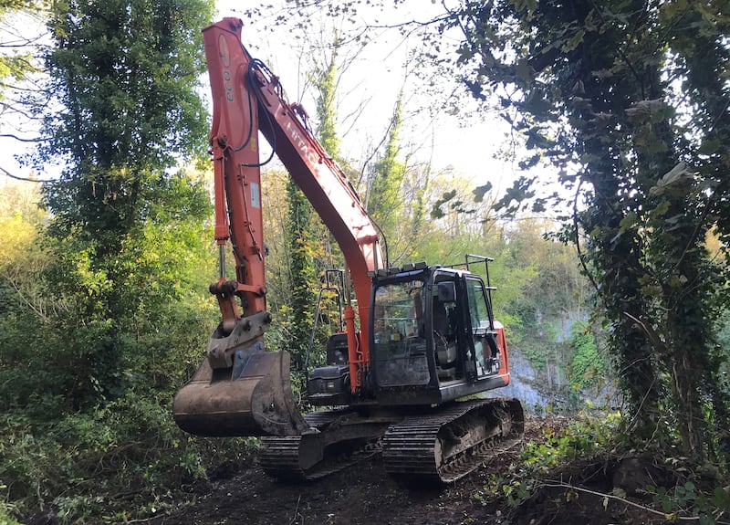 An excavator at the scene of a previous search for Charlotte Murray in Benburb, Co Tyrone