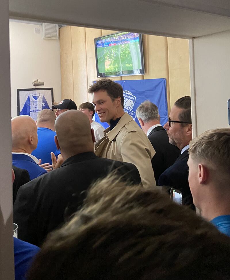 Former NFL footballer Tom Brady with Birmingham City fans in the Roost pub, one of the home fans’ pubs near to Birmingham City football club