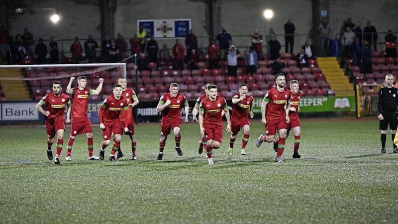 The Cliftonville players celebrate their controversial penalty shoot-out win over Crusaders on Tuesday night 