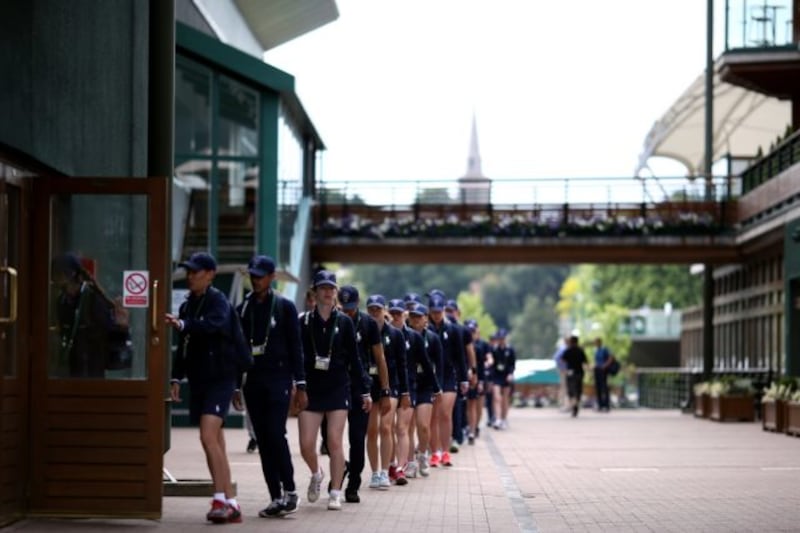 Ball boys and girls on day ten of the Wimbledon Championships 2016 at the All England Lawn Tennis and Croquet Club, Wimbledon.