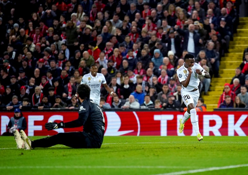 Vinicius Jr, right, inspired Real Madrid’s 5-2 win at Anfield last season