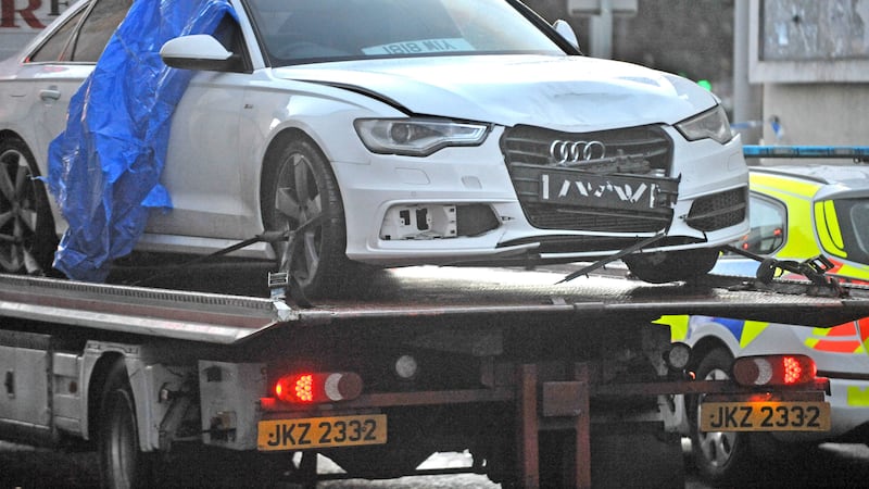 A white Audi A6 being towed away after it was stopped in a high-speed chase on Friday. Picture by Alan Lewis, Photopress 