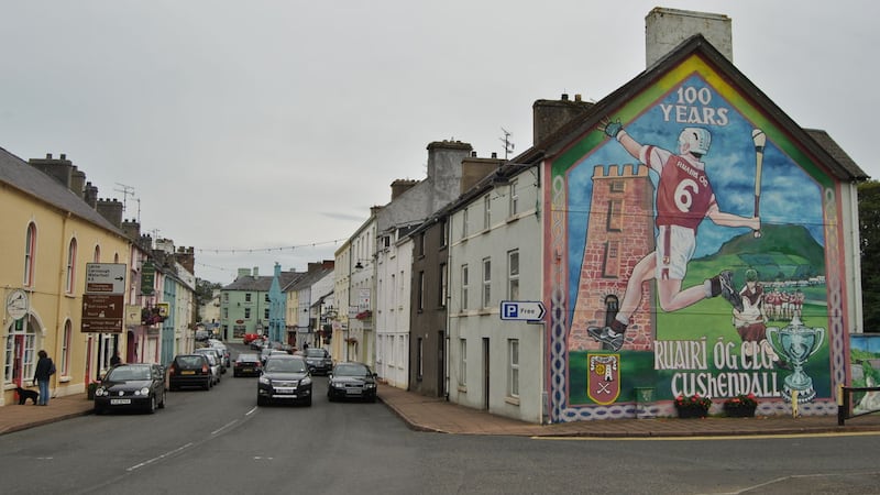 <strong><span style="font-stretch: normal; line-height: normal; font-family: Helvetica;">THE DALL:</span></strong> Hurling has long played a central part in the life of the Glens as this mural shows but the area has so much more as you would expect from an area of outstanding natural beauty