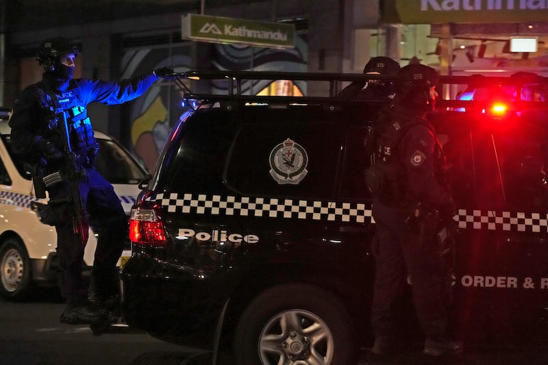 Police leave Westfield shopping centre, where multiple people were stabbed (Rick Rycroft/AP)