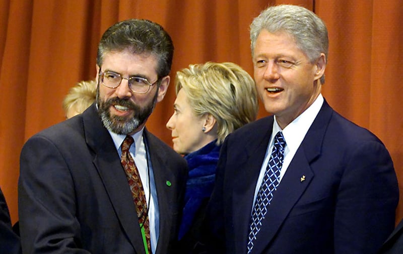 File photo dated 12/12/2000 of American President Bill Clinton (right) greeting Sinn F&eacute;in President Gerry Adams at the Guinness Storehouse in Dublin&nbsp;