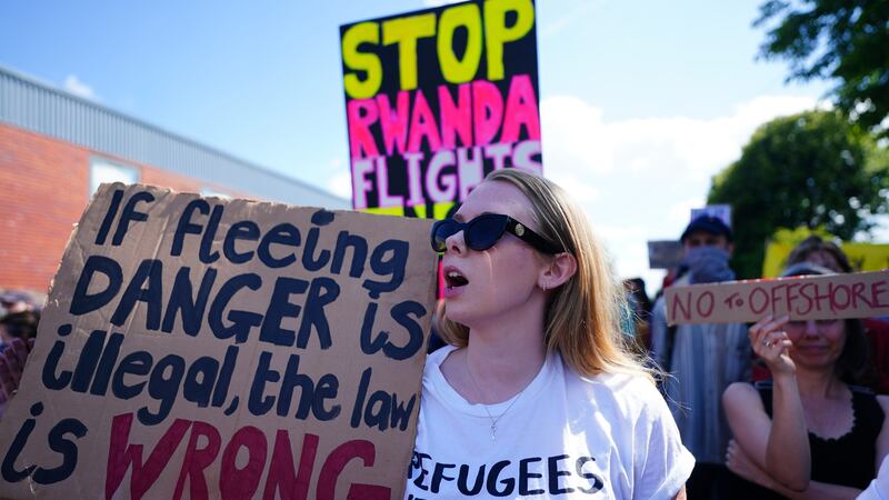 Demonstrators against the Rwanda policy at a removal centre at Gatwick (Victoria Jones/PA)