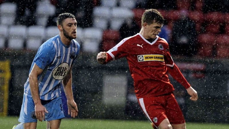 Levi Ives scored a stunning free-kick to help Cliftonville to a 2-1 win over Coleraine at the Showgrounds on Saturday 