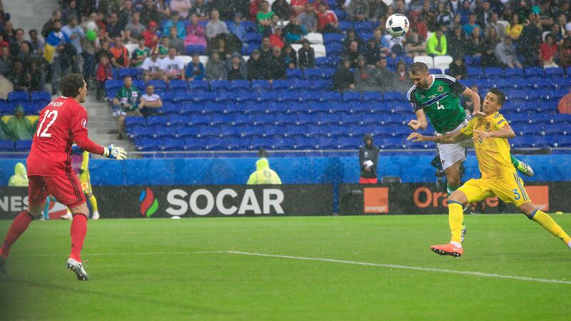 <span style="color: rgb(68, 68, 68); font-family: Verdana, Arial, Helvetica, sans-serif; font-size: 12.1px; line-height: 16.5px;">Northern Ireland's Gareth McAuley scoring against Ukraine</span>&nbsp;