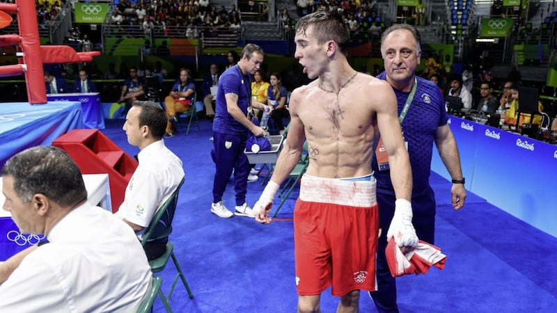 Michael Conlan makes his feelings known to the ringside judges after his controversial exit from the Olympic Games in August