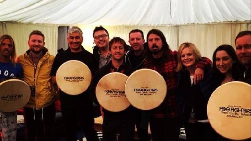 Foo Fighters joked they are ready to join folk legends The Dubliners after posing with commemorative Slane bodhrans 