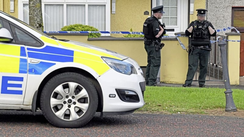 Police at the Ratheen Avenue property in Cookstown where a 77-year-old woman was found dead on Sunday. Picture by Hugh Russell 
