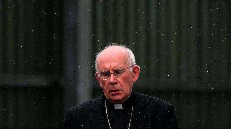 Cardinal Sean Brady leaves after giving evidence to the Historical Institutional Abuse inquiry in Co Down. Picture by Brian Lawless/PA Wire 