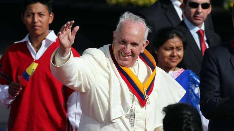 Pope Francis waves upon his arrival to the Mariscal Sucre International airport in Quito, Ecuador on Sunday July 5 as he starts a South American visit which also takes in Bolivia and Paraguay 