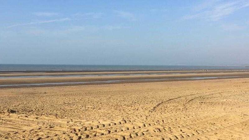 POPULAR BEACH: Camber Sands where five men drowned on Wednesday. Inset, one of the drowning victims Nitharsan Ravi	       MAIN PICTURE: Tom Pugh/PA 