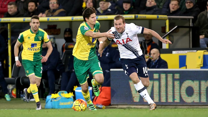 Tottenham Hotspur's Harry Kane (right) in action against Norwich City&nbsp;