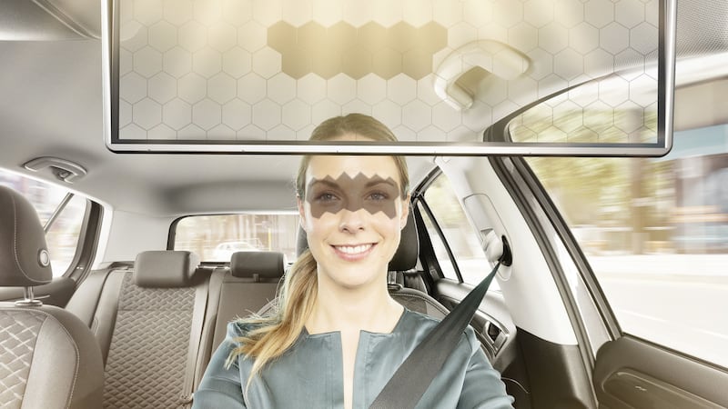 Bosch has unveiled a smart car sun visor which uses face-tracking cameras to darken parts of an LCD panel to protect a driver’s eyes.