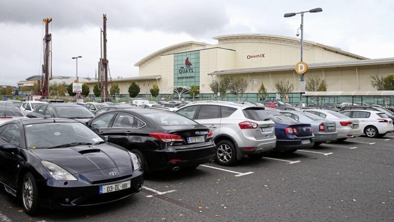Two girls were attacked by a gang of 11 men at the carpark of the Quays Centre in Newry. 