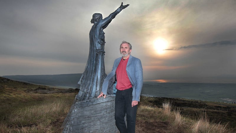 SDLP councillor Gerry Mullan with the new replacement sculpture of Manannan Mac Lir, the Celtic God of the Sea&nbsp;