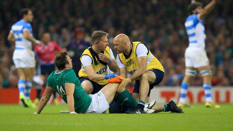 Ireland&#39;s Tommy Bowe receives medical attention during the Rugby World Cup quarter-final against Argentina 