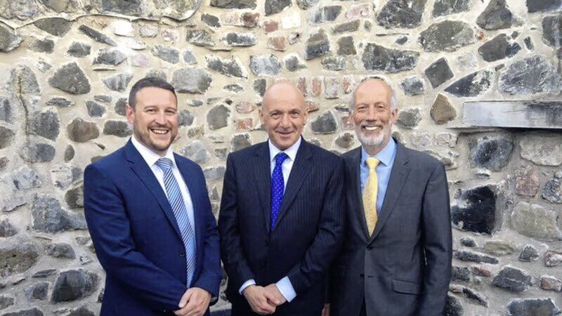 Newly appointed Alliance councillor Julian McGrath with new MLA John Blair and retiring assembly member David Ford 