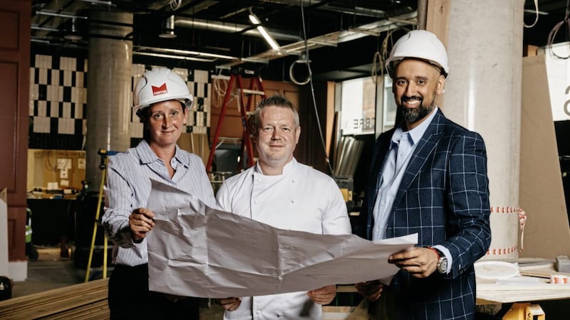 Flame&rsquo;s Sarah Jane Sinclair, Tony McBride and Gaurav Kher at the new 120-seater restaurant in The Ewart building on Bedford Street. 