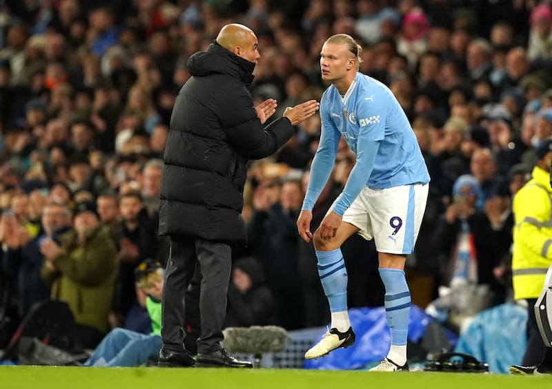 Pep Guardiola, left, leapt to the defence of Erling Haaland