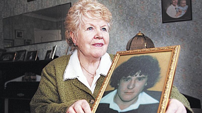 Margaret McKinney with a photo of her son Brian. Picture by Hugh Russell 
