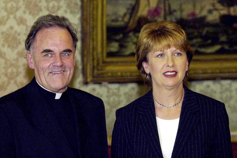 Fr Aidan Troy pictured with Mary McAleese in 2001 when she was president. Mrs McAleese grew up in Ardoyne. Picture by Frank Miller 