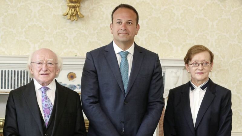 The Republic&#39;s former attorney general Maire Whelan, Taoiseach Leo Varadkar and President Michael D Higgins, after Ms Whelan was appointed a Court of Appeal judge at &Aacute;ras an Uachtar&aacute;in in Dublin Picture by Niall Carson/PA 