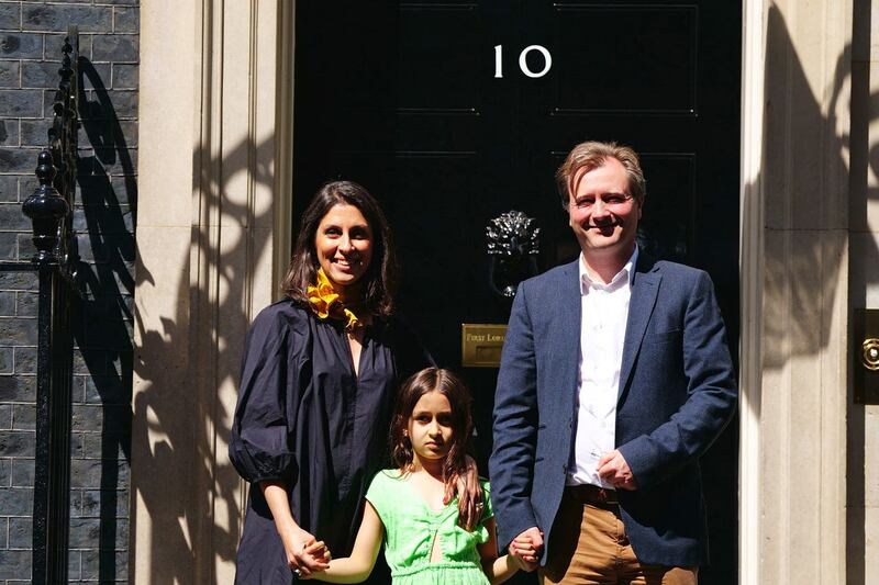 Ms Zaghari-Ratcliffe with her husband Richard and daughter Gabriella as they leave 10 Downing Street last year 