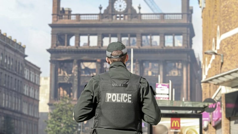Police at the cordan near the Primark store in Belfast that was gutted by fire Picture Mal McCann. 