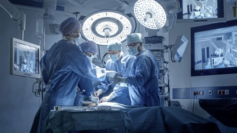 Medical Team Performing Surgical Operation in Modern Operating Room. 