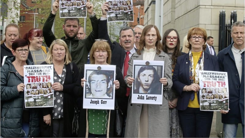 Families and survivors of the Ballymurphy massacre outside court in Belfast yesterday 