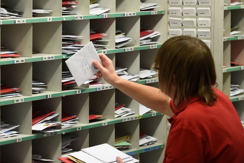 Royal Mail says letter deliveries have almost halved since 2011