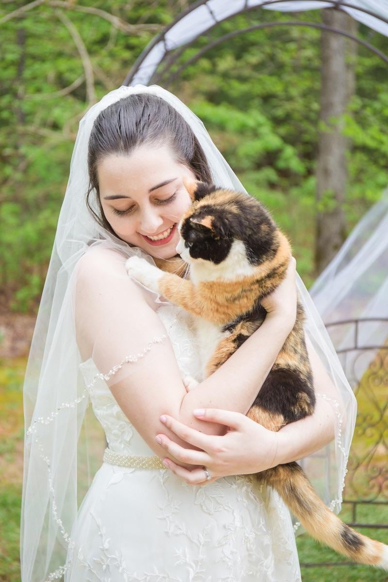 Bride Helen Zuckerman and her cat Angel (Sydney Kane/DMV Portraits)