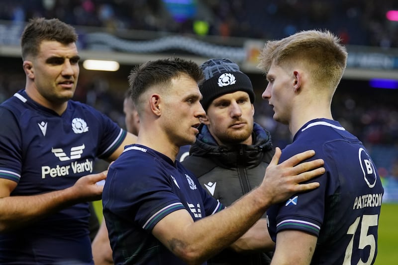Scotland team-mates acclaim Harry Paterson, right, after his debut