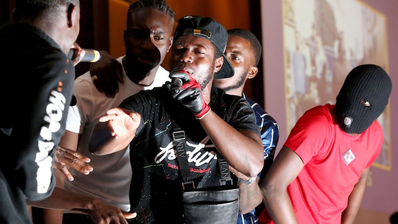 Hope Dealers, a London rap group featuring former gang members, use music videos and church performances to lure young people away from violence.
