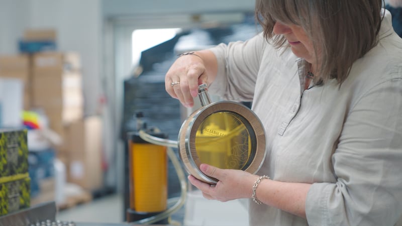 Slianh Liag Distillers co-founder Moira Doherty carefully fills one of the bottles for the extremely limited Kilcar release