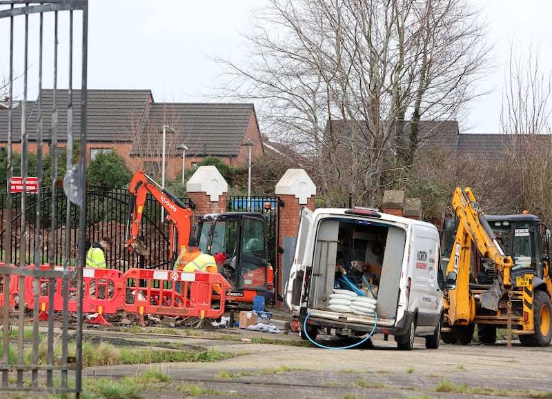 Contractors working at the Adam Street site off Duncairn Avenue. PICTURE: MAL MCCANN