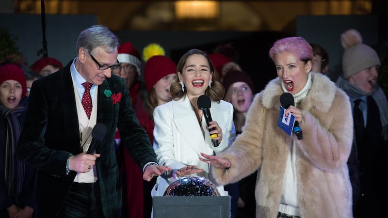 Emilia Clarke, Dame Emma Thompson and Paul Feig pressed the button to illuminate Covent Garden’s Christmas tree.