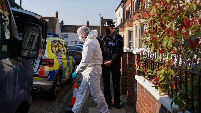 Forensic officers at the scene in Moore Street, Kingsley, Northampton (Jacob King/PA)