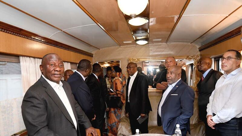 South African president Cyril Ramaphosa, left, and other delegates will visit Russia (South African Government Communication and Information Services via AP)