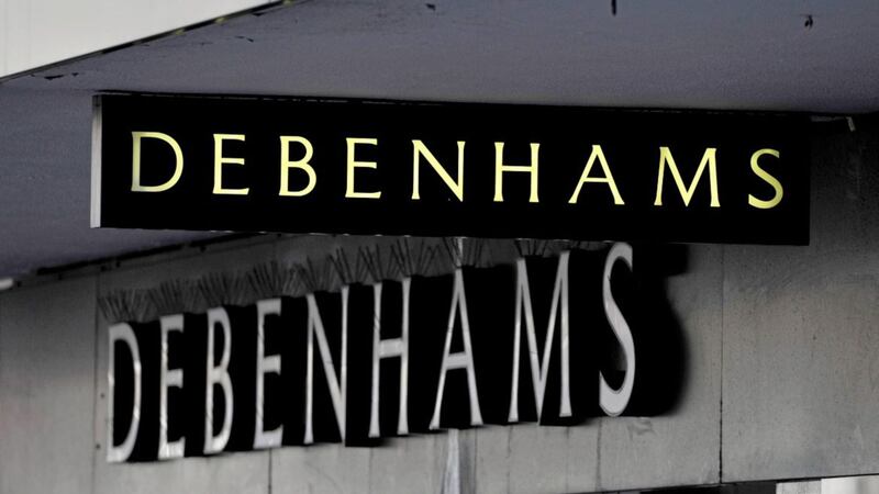 Department store chain Debenhams has reported a collapse in annual profits 