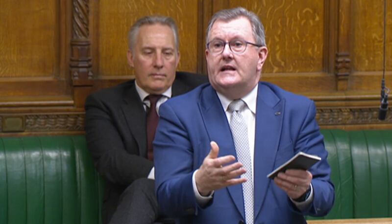 Sir Jeffrey Donaldson speaking in the house of Commons with Ian Paisley sitting behind