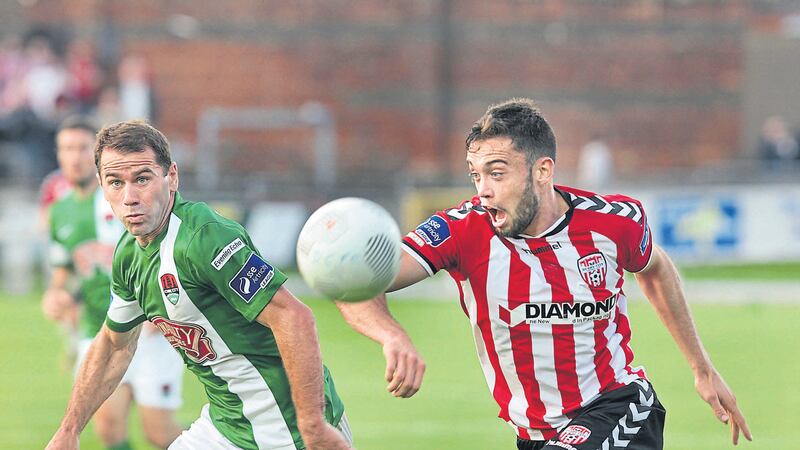 &nbsp;David Mulcahy of Cork closes in on Derry City&rsquo;s Nathan Boyle during last night&rsquo;s SSE Airtricity League Premier Division match at the Brandywell  Picture: Margaret McLaughlin