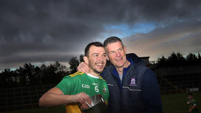 Enda Gormley pictured with man of the match Michael Warnock after Glen's first senior county title success in 2021. A decade earlier Gormley had managed Warnock's team to their first Derry minor championship in 24 years, and only their second ever. Picture: Margaret McLaughlin