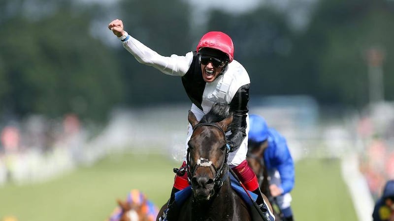 Frankie Dettori celebrates his victory on Golden Horn in the Investec Derby on Derby Day of the 2015 Investec Derby Festival at Epsom Racecourse, Epsom. 