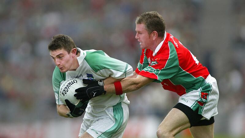 Fermanagh's Colm Bradley shields the ball from Mayo's Conor Moran during their All-Ireland semi-final in 2004 <br />Picture by Ann McManus&nbsp;